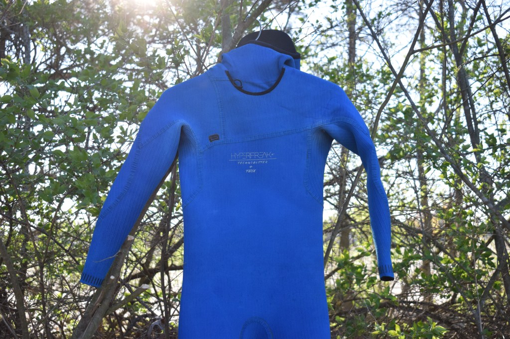 O'Neill 5/4+ wetsuit hanging up, inside out