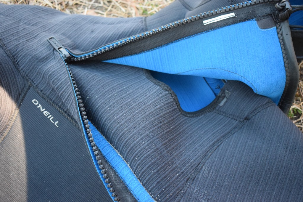 O'Neill Hyperfreak 5/4+ Chest Zip entry photo with zipper and cinch.